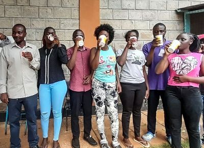Students enjoy yoghurt at Bukura Agricultural College Imag
